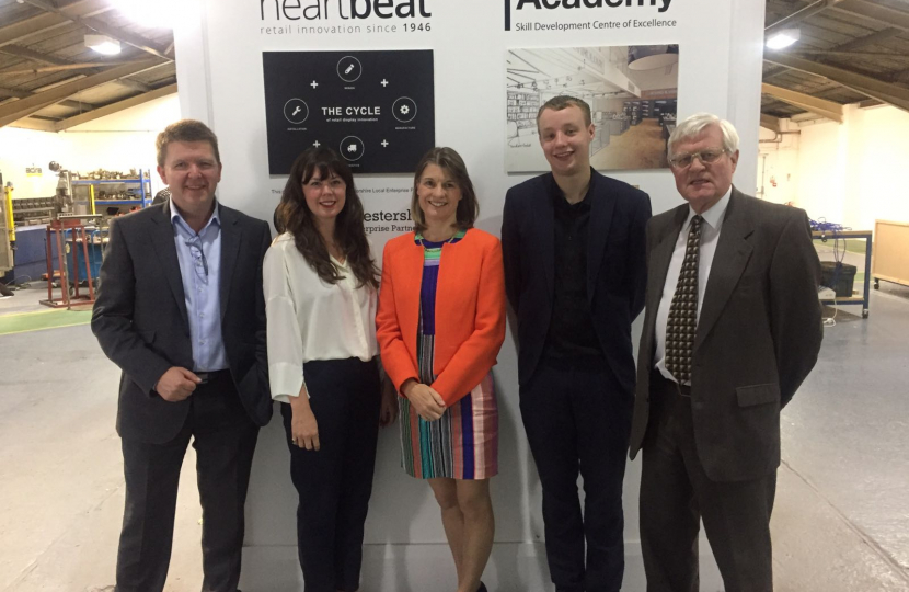 Rachel with management and staff at Heartbeat Manufacturing and Academy in the company of Redditch borough and Worcestershire county councillor Tom Baker-Price (second right)