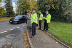 Rachel with local police officers conducting speed checks in Astwood Bank.