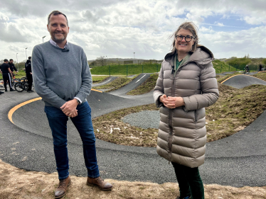 Rachel with Cllr Matt Dormer at the brand-new pump track.